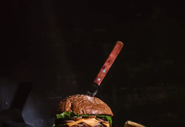 Styled burger with lettuce and tomato for test and development kitchen hire