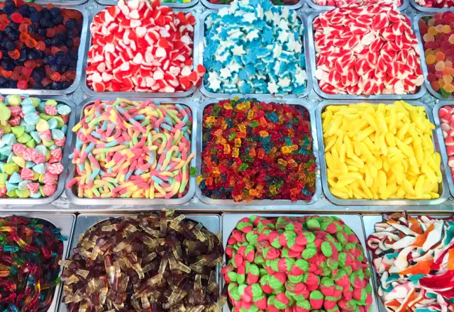 Assorted candies in plastic containers for kitchen rental for chocolatiers