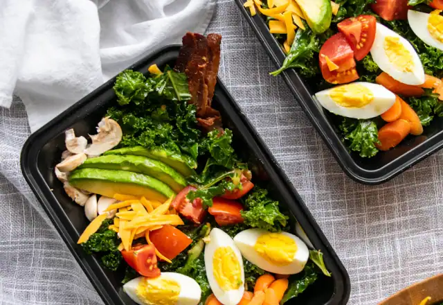 Trays of prepared meals for meal prep kitchen rental