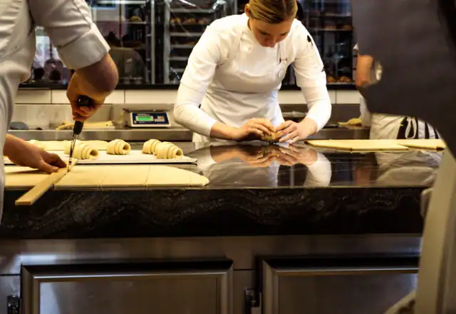 Chefs preparing pastries in a professional kitchen for shared kitchen rental